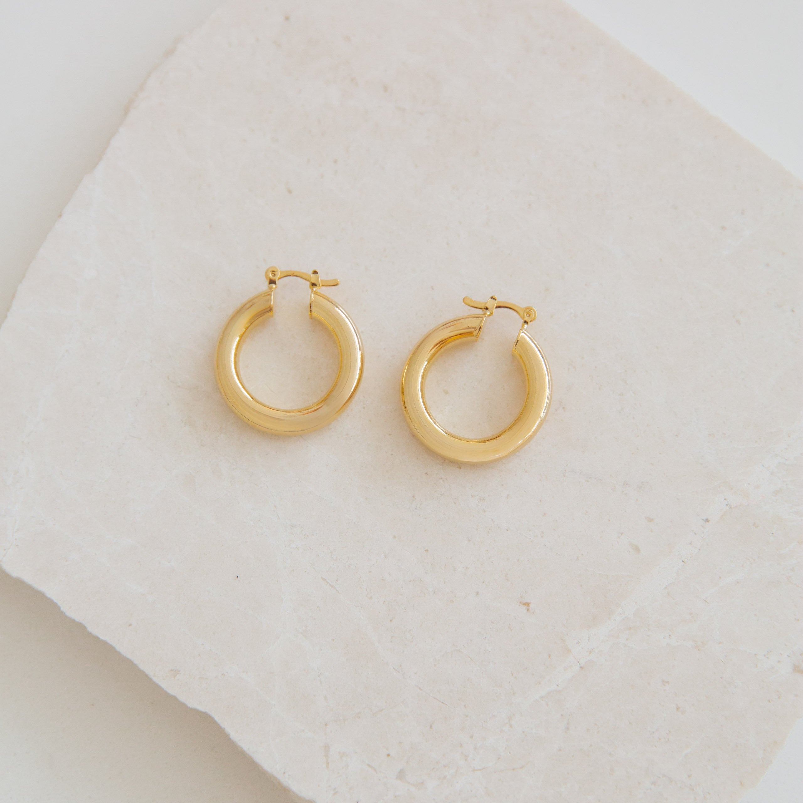 Goldie Hoops for women in Canada, best-selling lightweight 18k gold filled hoops. Easy day-to-night earrings by Lavender & Grace Designs.